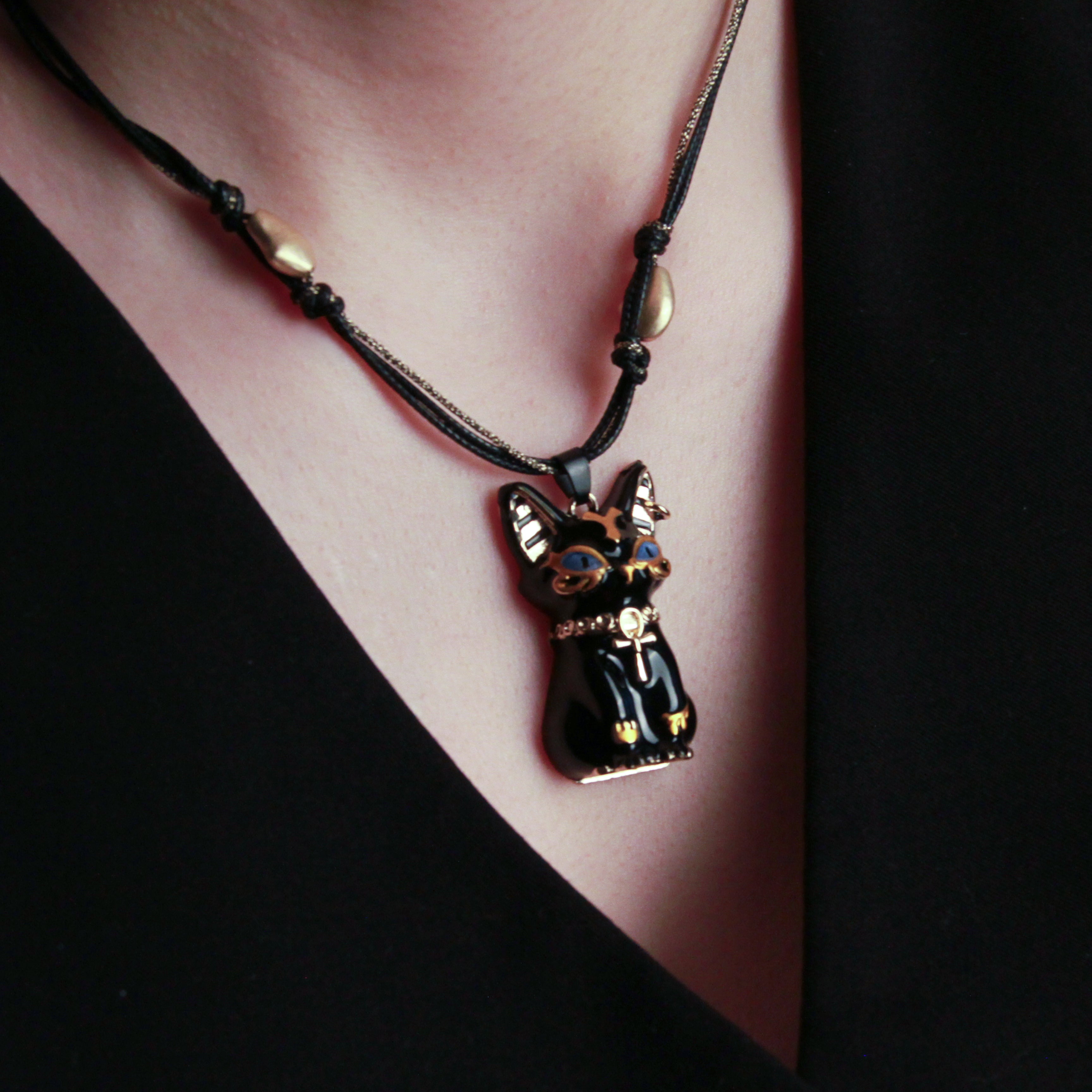 Close-up of the Black Bastet cat necklace and its detailed feline pendant