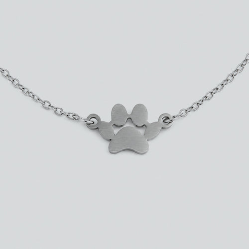 Layered silver cat bracelet with double chain links and cat charm, modern jewelry for cat lovers
