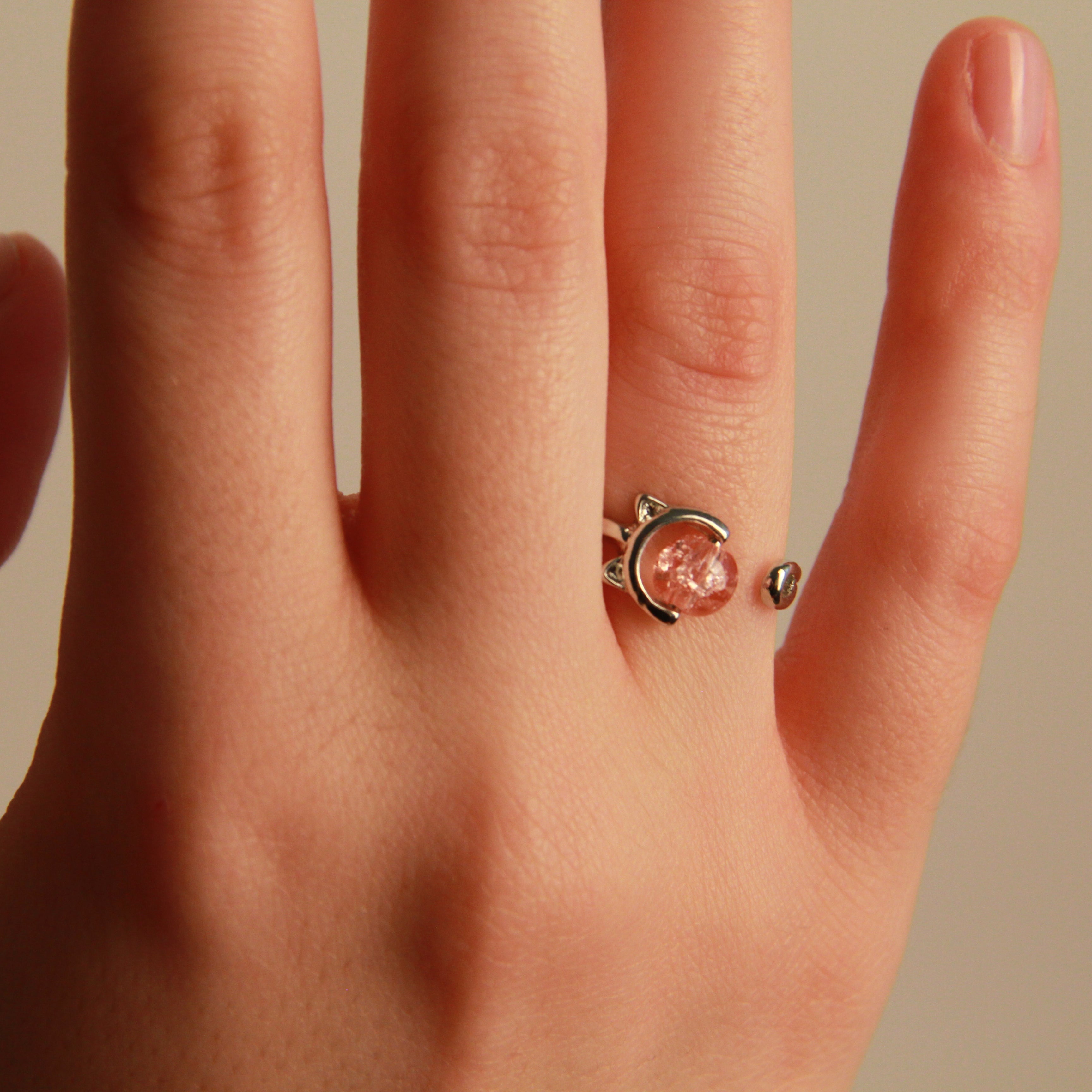 Elegant silver cat ring featuring a pink crystal detail, adjustable everyday jewelry for women