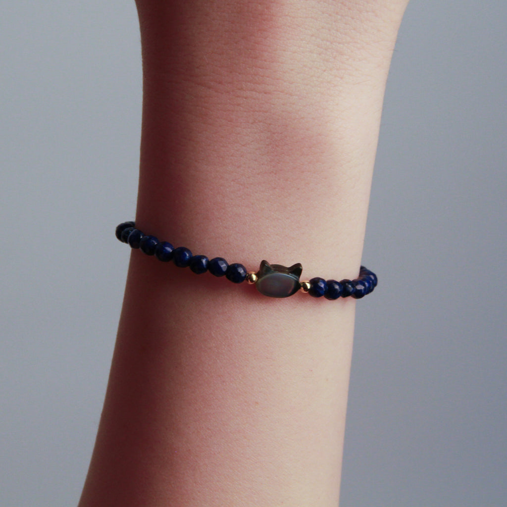 Silver cat bracelet with blue stone cat charm and beaded design, minimalist jewelry for cat lovers