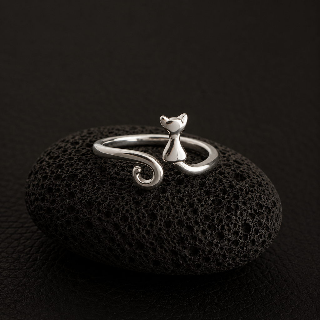 Curled Tail Cat Ring on black lava stone