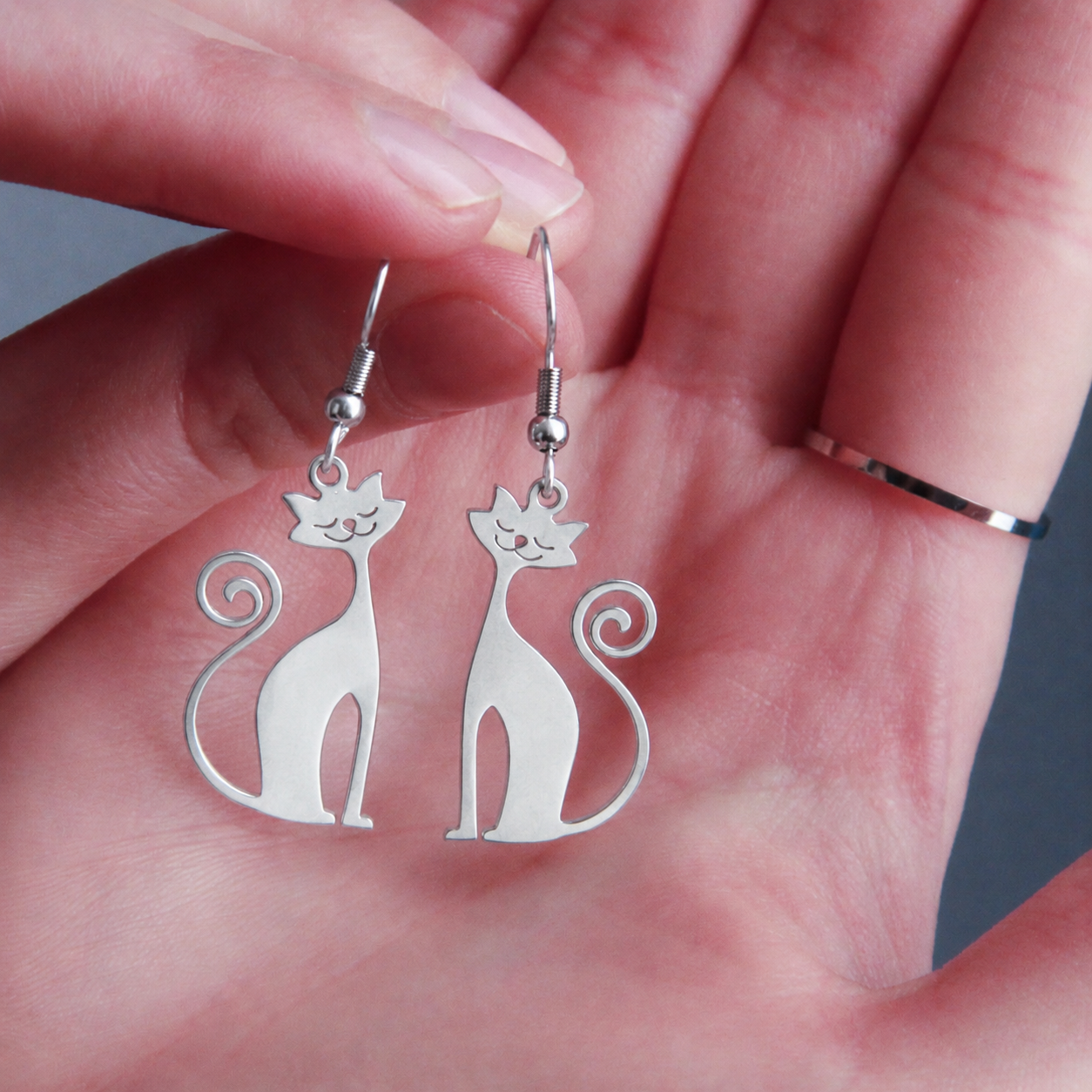 Elegant silver cat dangle earrings with simple feline design, everyday jewelry for women and cat enthusiasts