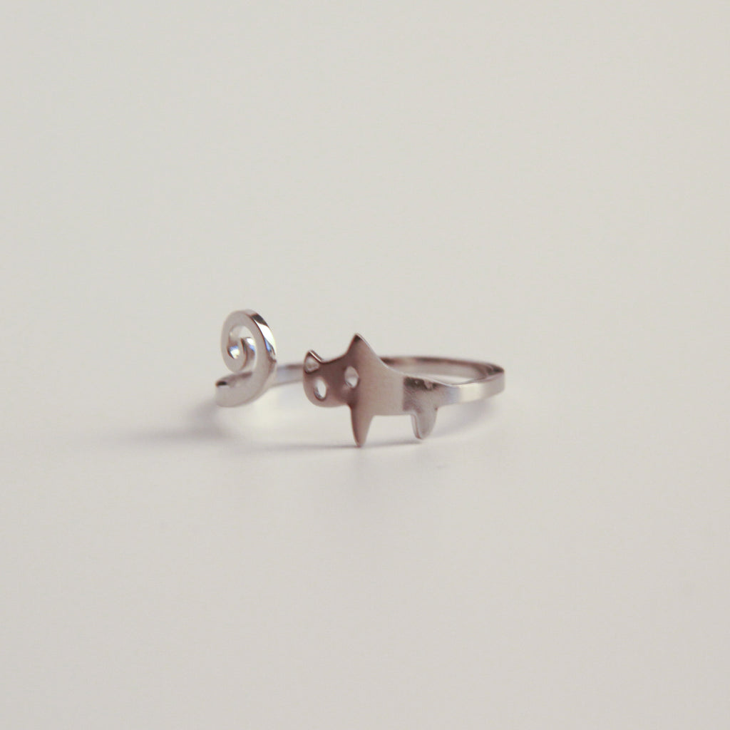 Adjustable silver cat ring with curled tail design, playful cat jewelry