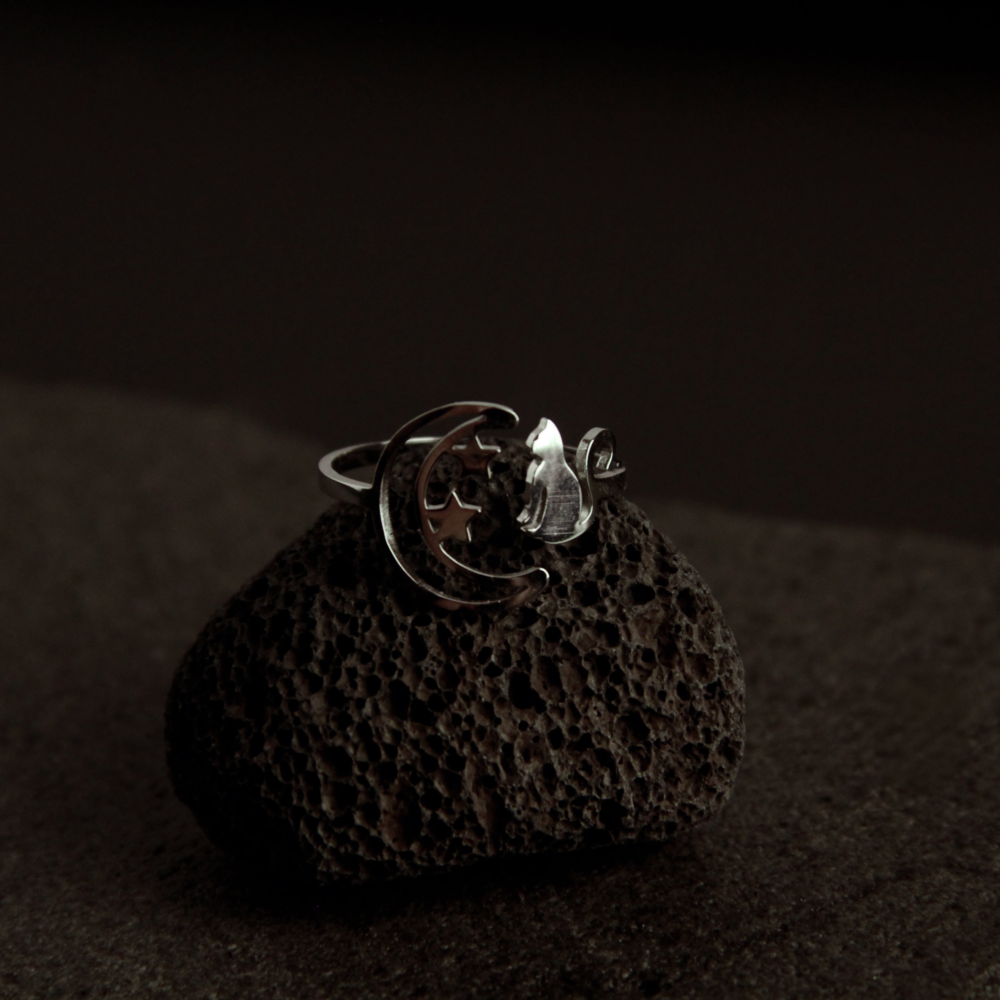 Adjustable sterling silver cat ring featuring moon and star details, elegant minimalist jewelry for cat lovers