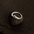 Minimalist sterling silver paw ring with charming cat paw detail, everyday jewelry for animal lovers
