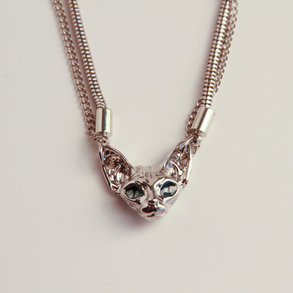 Silver cat necklace with Sphynx-inspired cat head pendant, bold statement jewelry1
