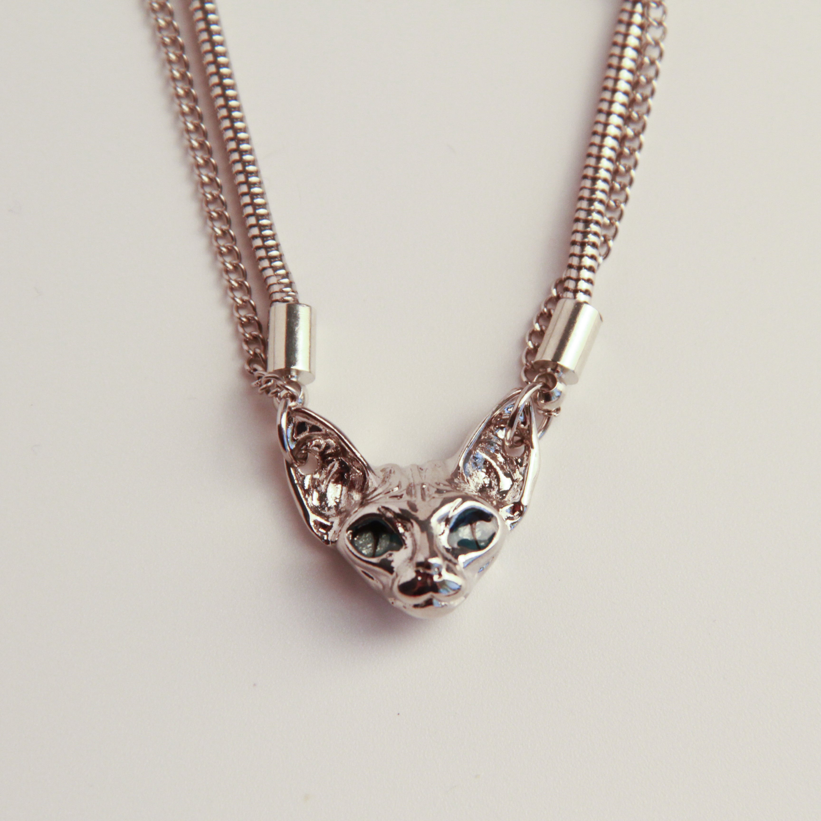 Silver cat necklace with Sphynx-inspired cat head pendant, bold statement jewelry1
