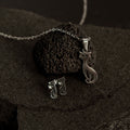 Minimalist silver cat jewelry set including necklace and earrings, elegant matching gift for cat lovers