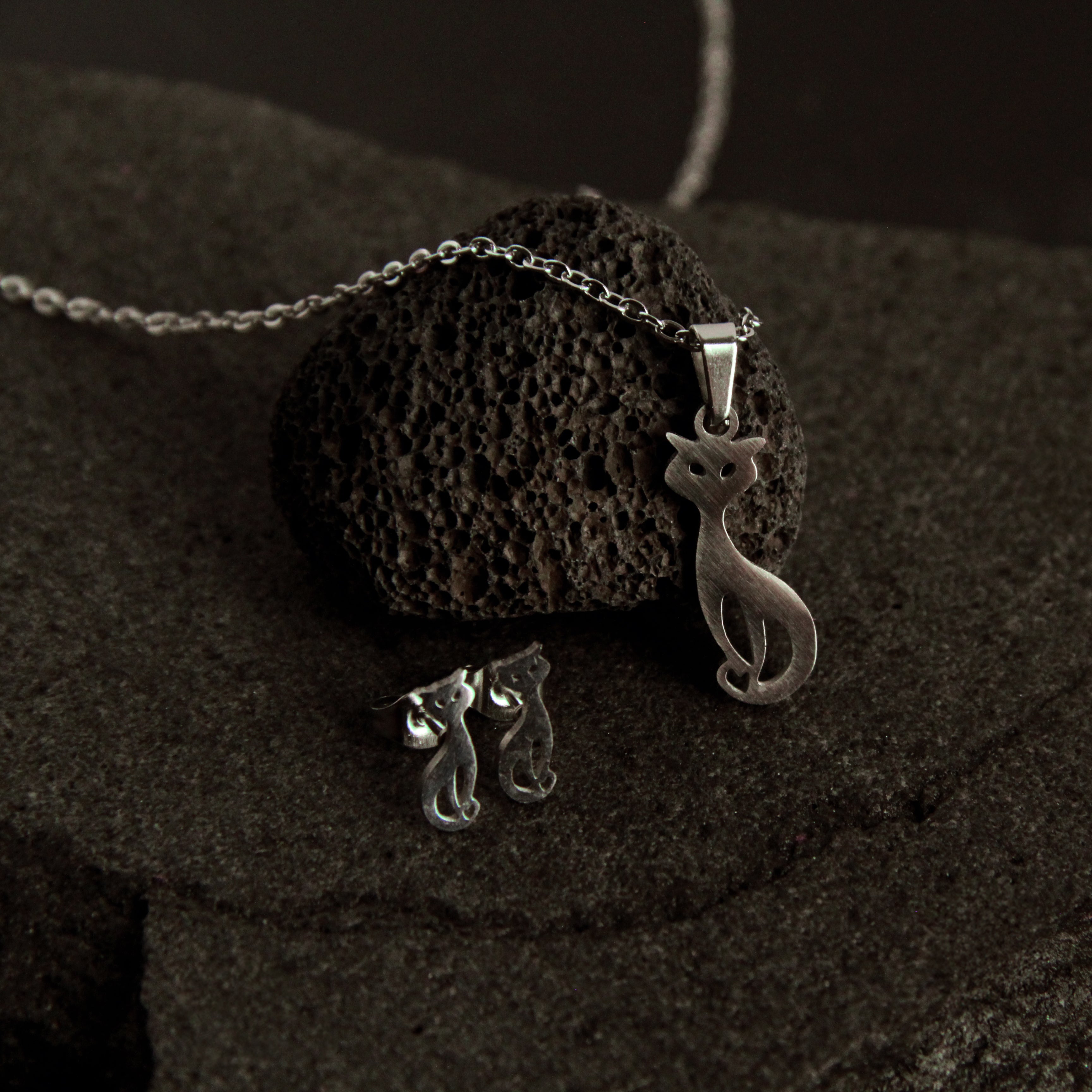 Minimalist silver cat jewelry set including necklace and earrings, elegant matching gift for cat lovers