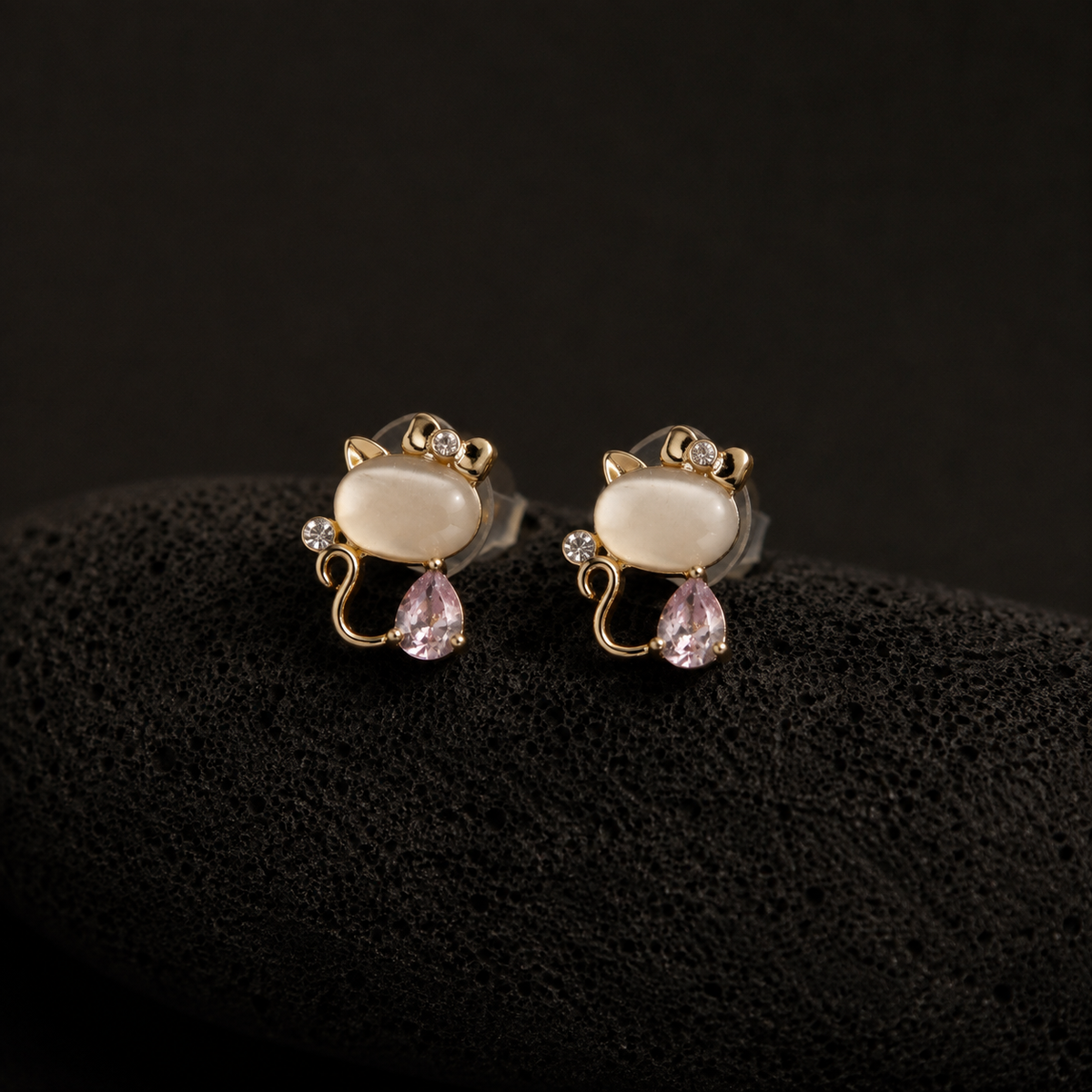 Blush Kitty cat earrings with pink teardrop stones and golden bows