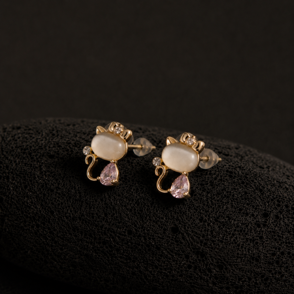 Blush Kitty cat earrings with pink teardrop stones and golden bows