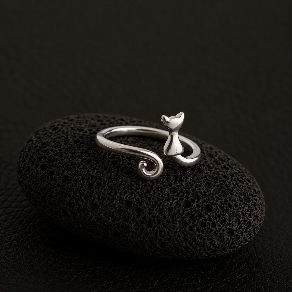 A silver ring shaped like a small cat 